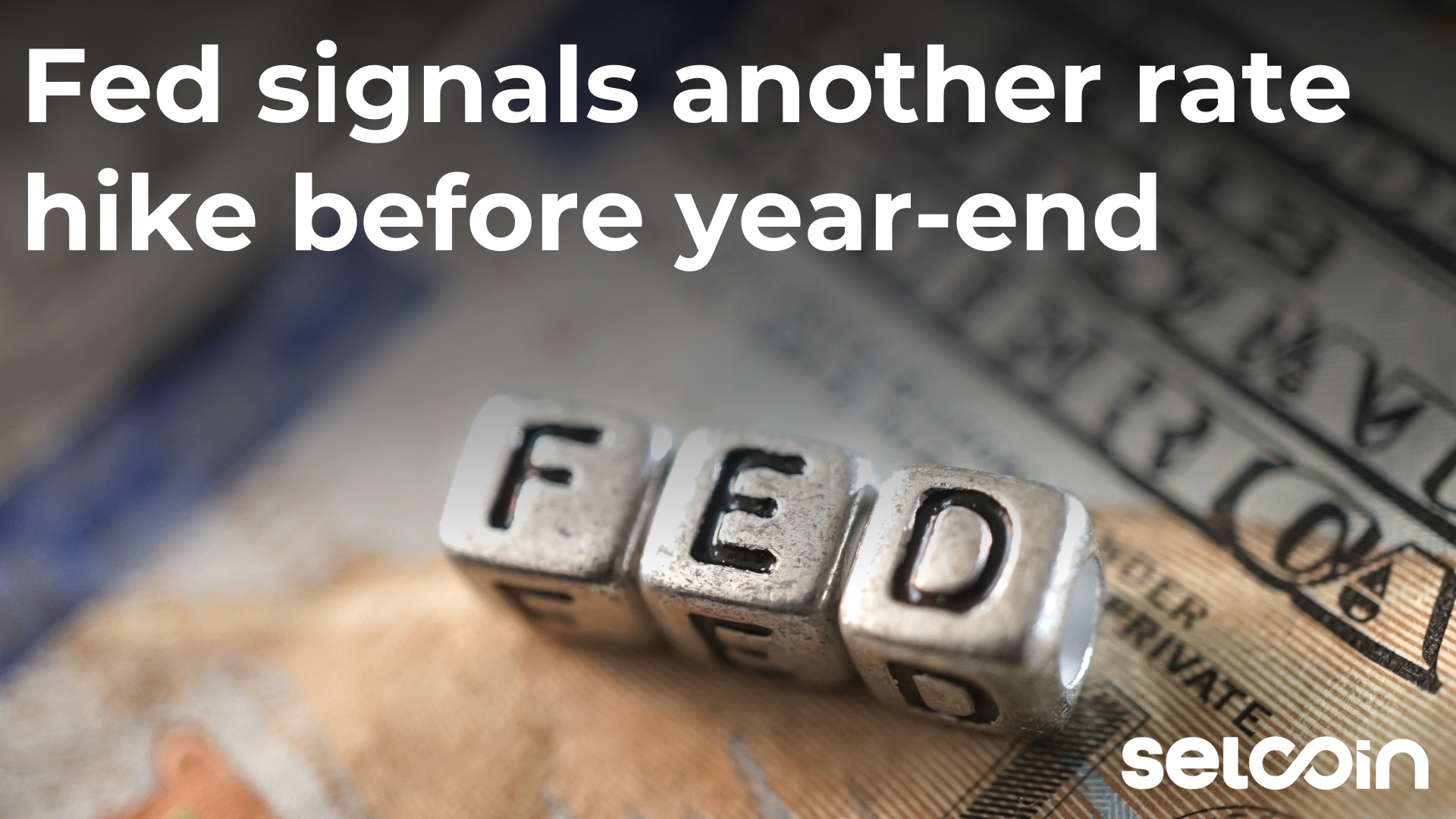 Fed signals another rate hike before year-end